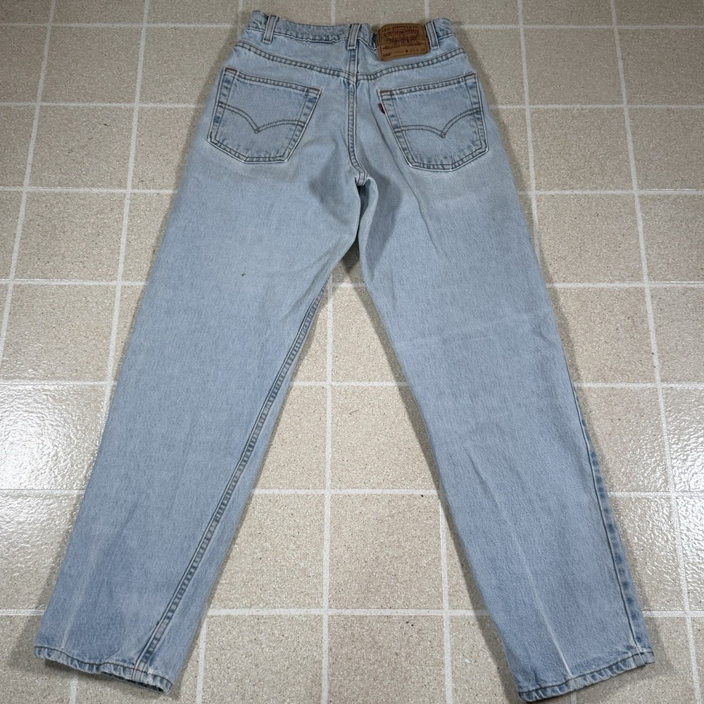 Vintage 90s Levi's 550 Light Wash Jeans Made In USA Red Tab 28x30 Denim Workwear